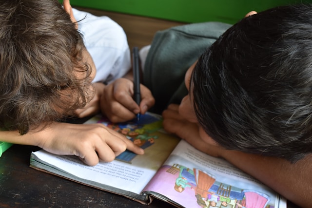 Children writing together